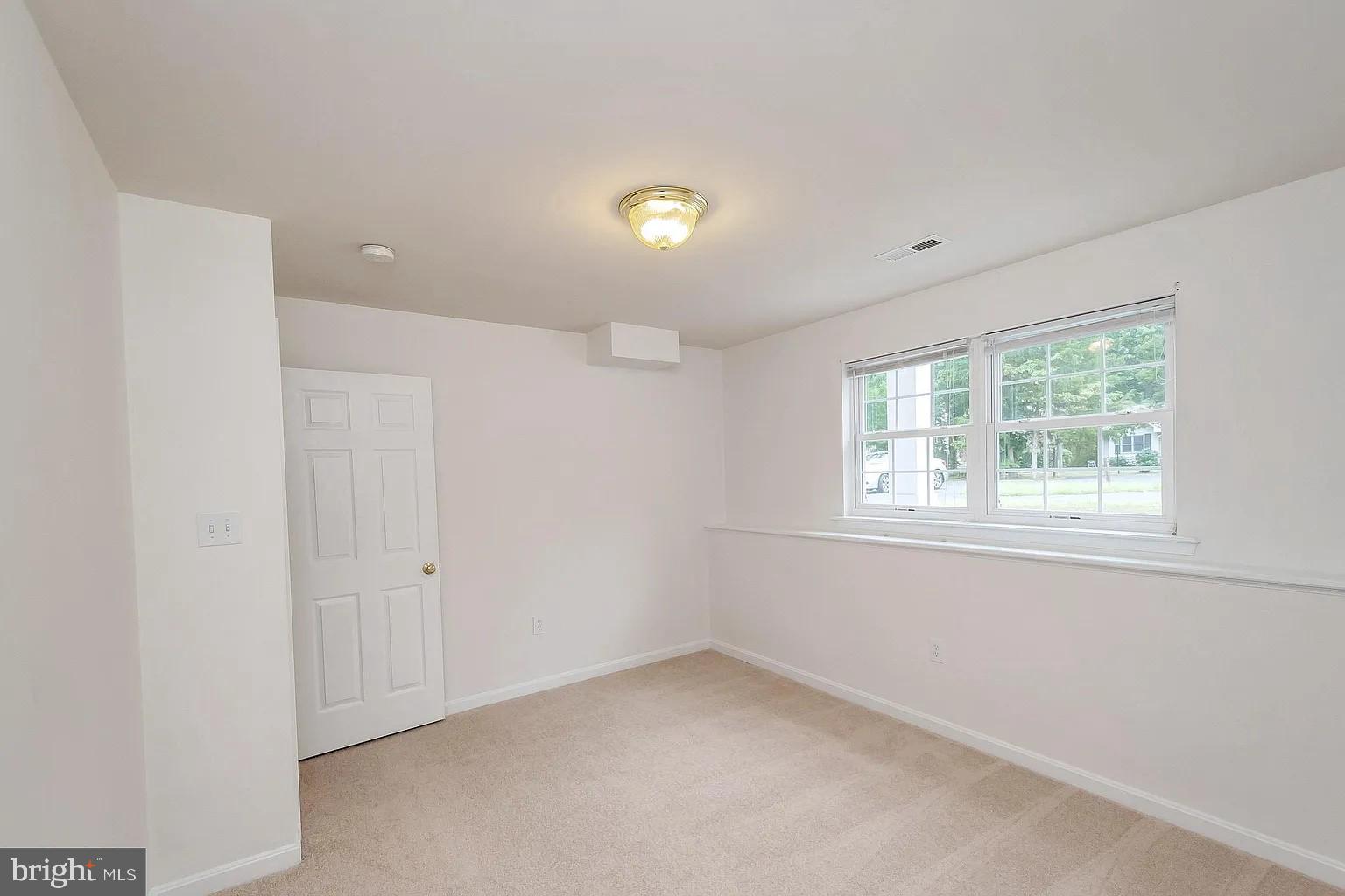 309 Liberty Boulevard Locust Grove, VA 22508 - Photo 15 of 42 a view of empty room with window