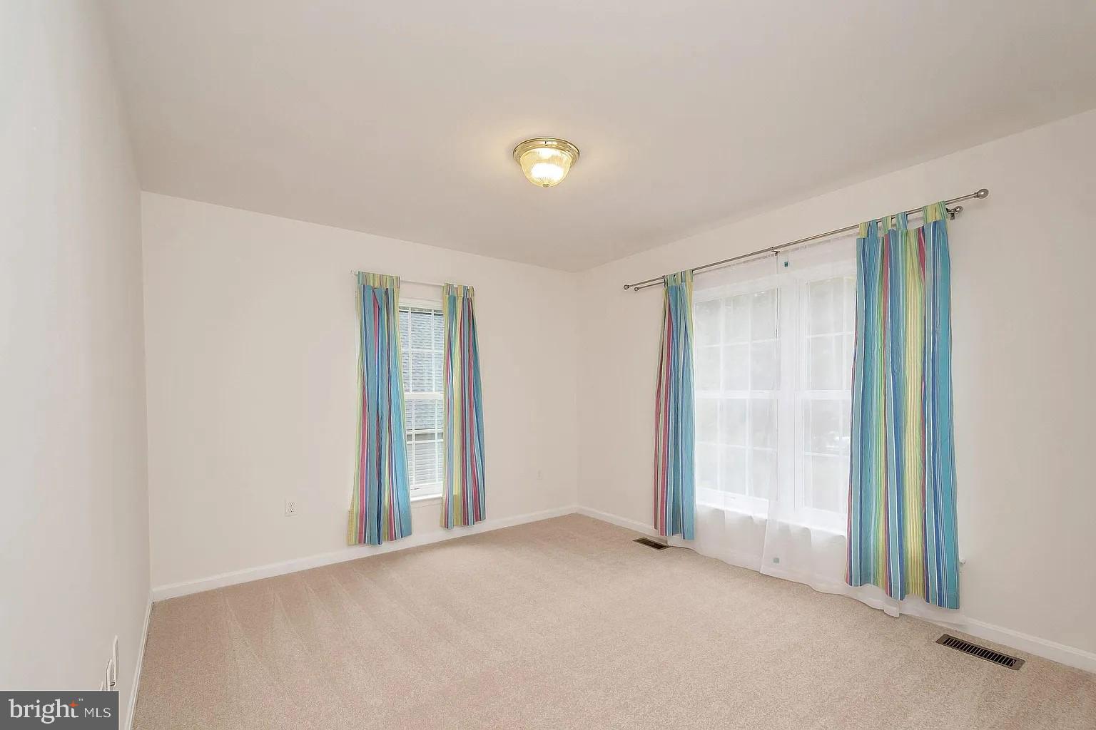 309 Liberty Boulevard Locust Grove, VA 22508 - Photo 17 of 42 a view of an empty room with a window