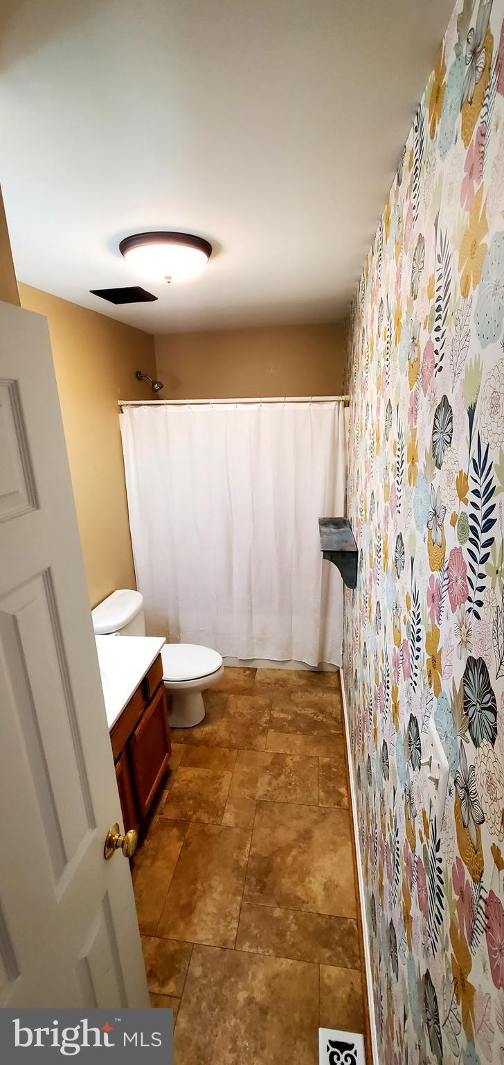 309 Liberty Boulevard Locust Grove, VA 22508 - Photo 23 of 42 a bathroom with a bathtub and shower