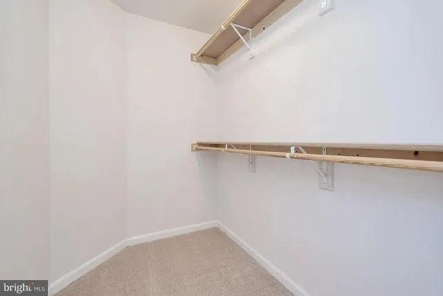 a view of a room with racks on the wall