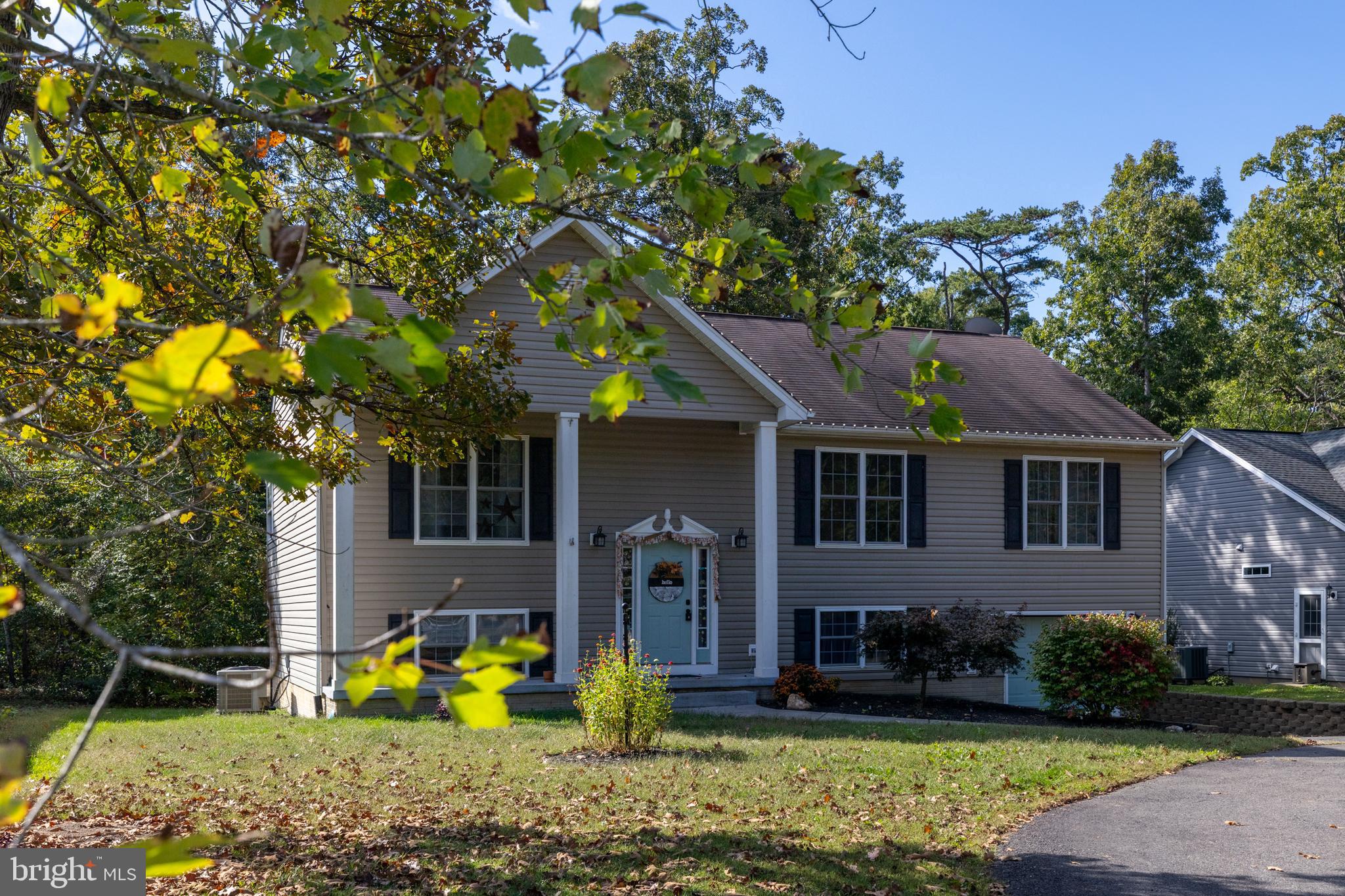 309 Liberty Boulevard Locust Grove, VA 22508 - Photo 29 of 42 a front view of a house with garden
