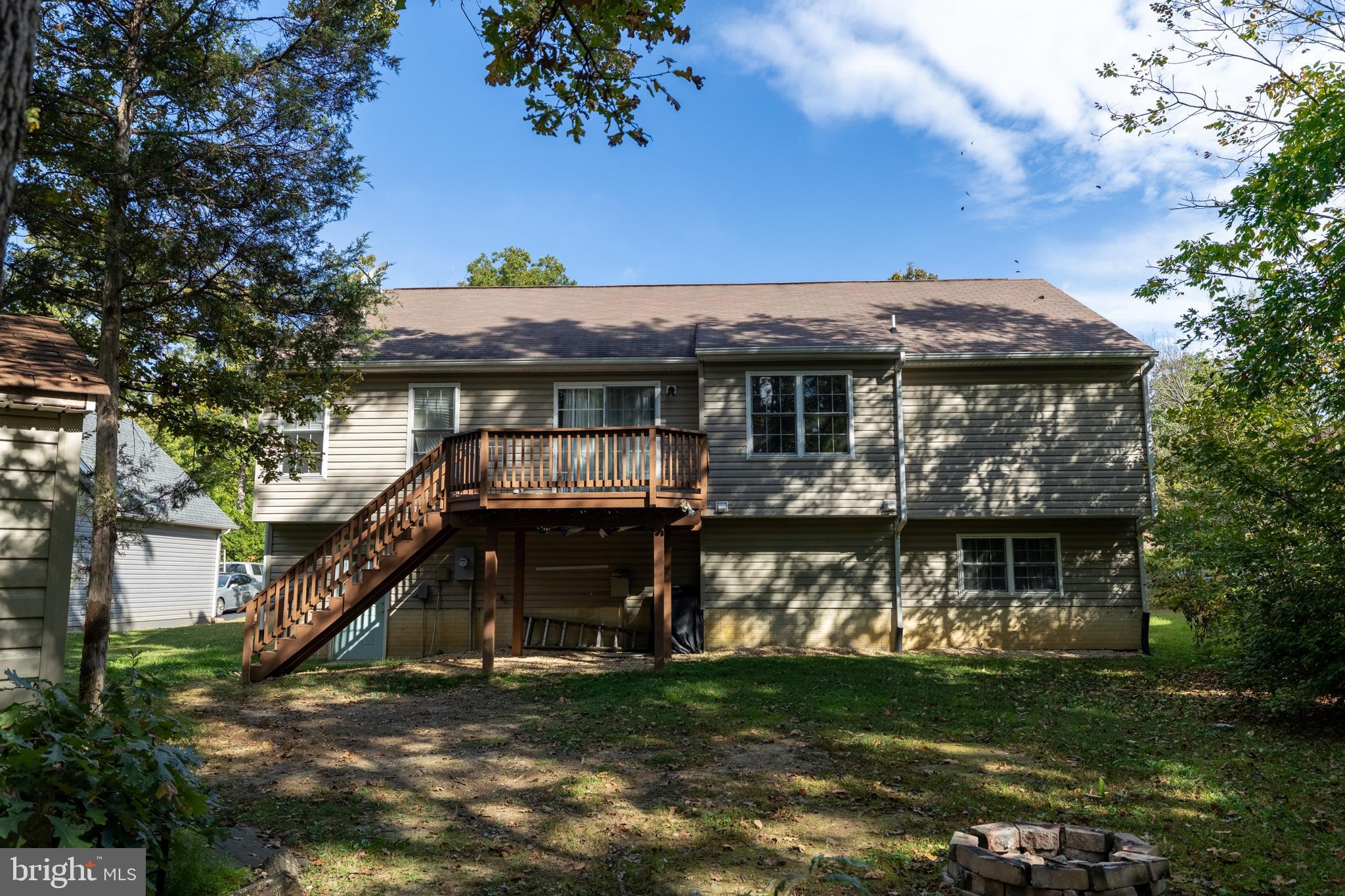 309 Liberty Boulevard Locust Grove, VA 22508 - Photo 30 of 42 a front view of house with a garden