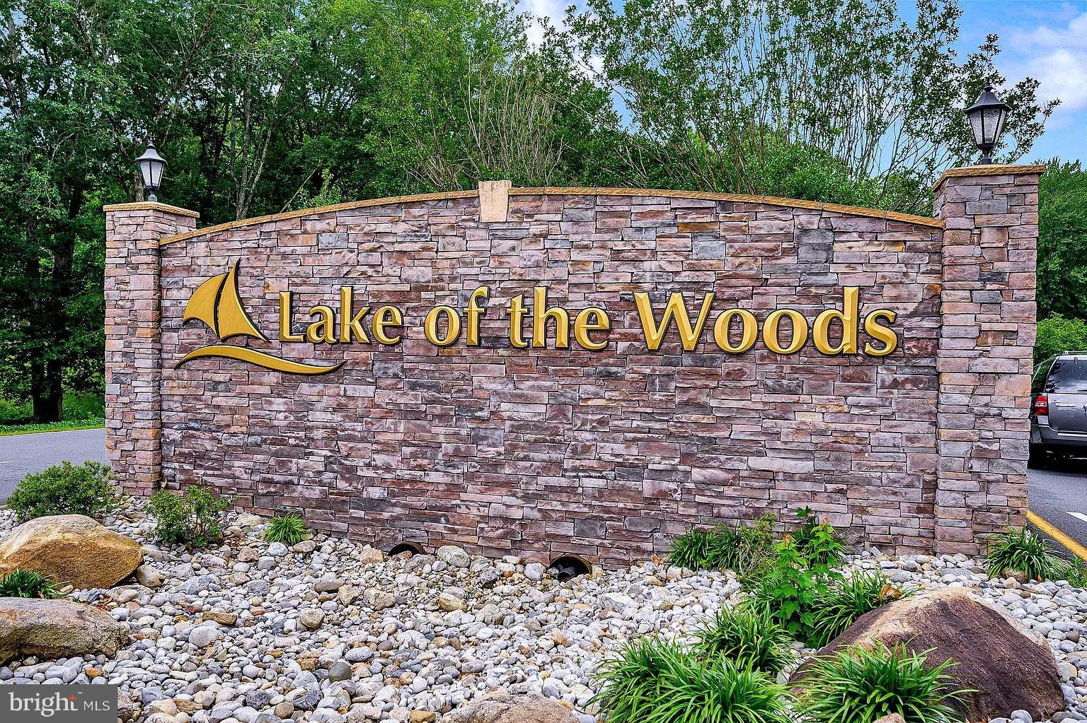 309 Liberty Boulevard Locust Grove, VA 22508 - Photo 34 of 42 a sign that is sitting on a brick wall