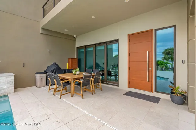 a view of a terrace with chairs