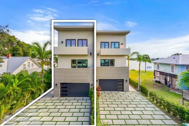 a black and white photo of a living room