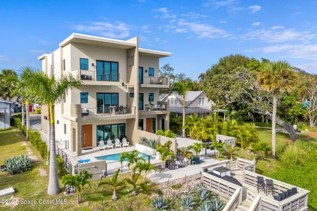 a bathroom with a granite countertop sink mirror and a bathtub