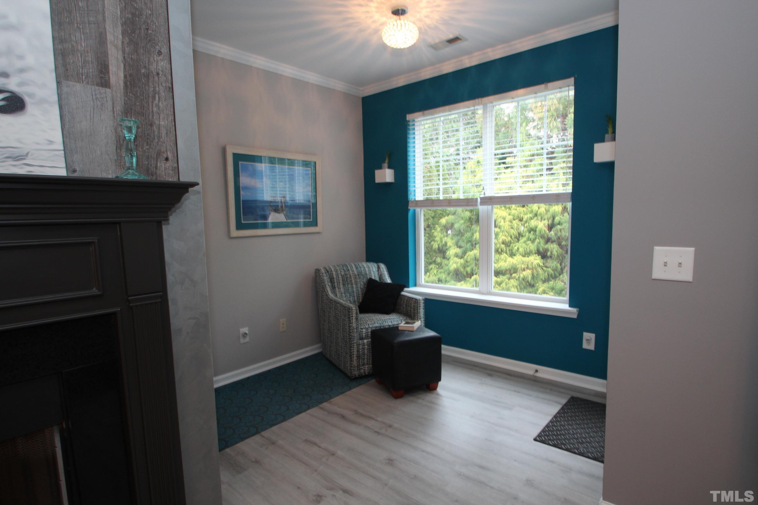5804 Cameo Glass Way Raleigh, NC 27612 - Photo 18 of 25 a living room with furniture and a window