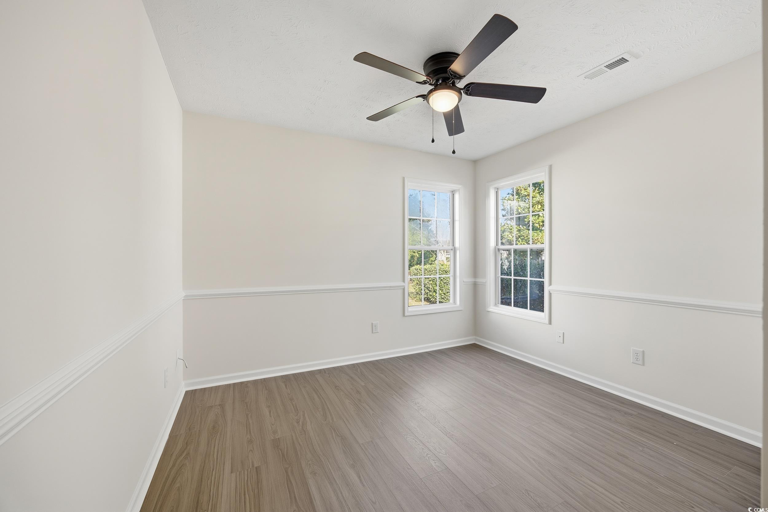 638 Hatteras River Road Myrtle Beach, SC 29588 - Photo 19 of 33 Walk in closet featuring light wood finished floors