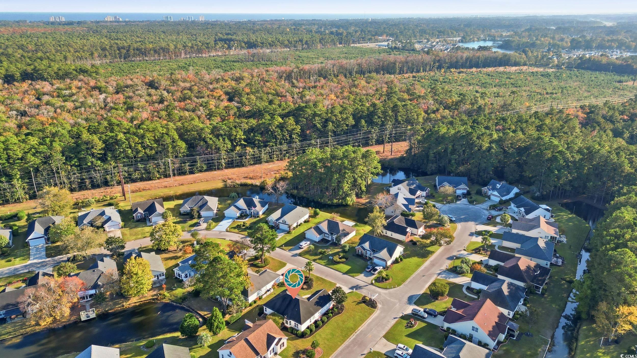638 Hatteras River Road Myrtle Beach, SC 29588 - Photo 30 of 33 View of front of home with a front lawn and roof with shingles