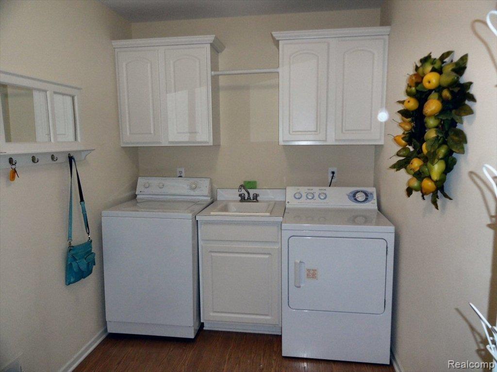 8112 Huntington Ridge Court, Unit 5 Washington, MI 48094 - Photo 16 of 24 LAUNDRY ROOM