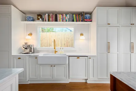 a view of cabinets with wooden floor