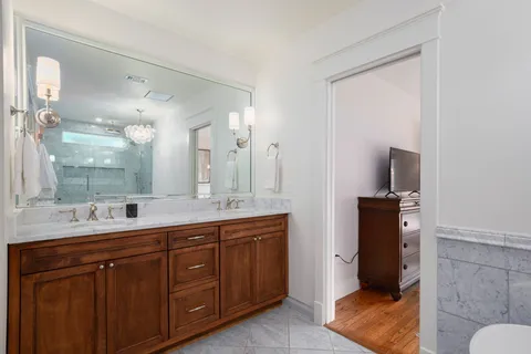 a bathroom with a shower and toilet