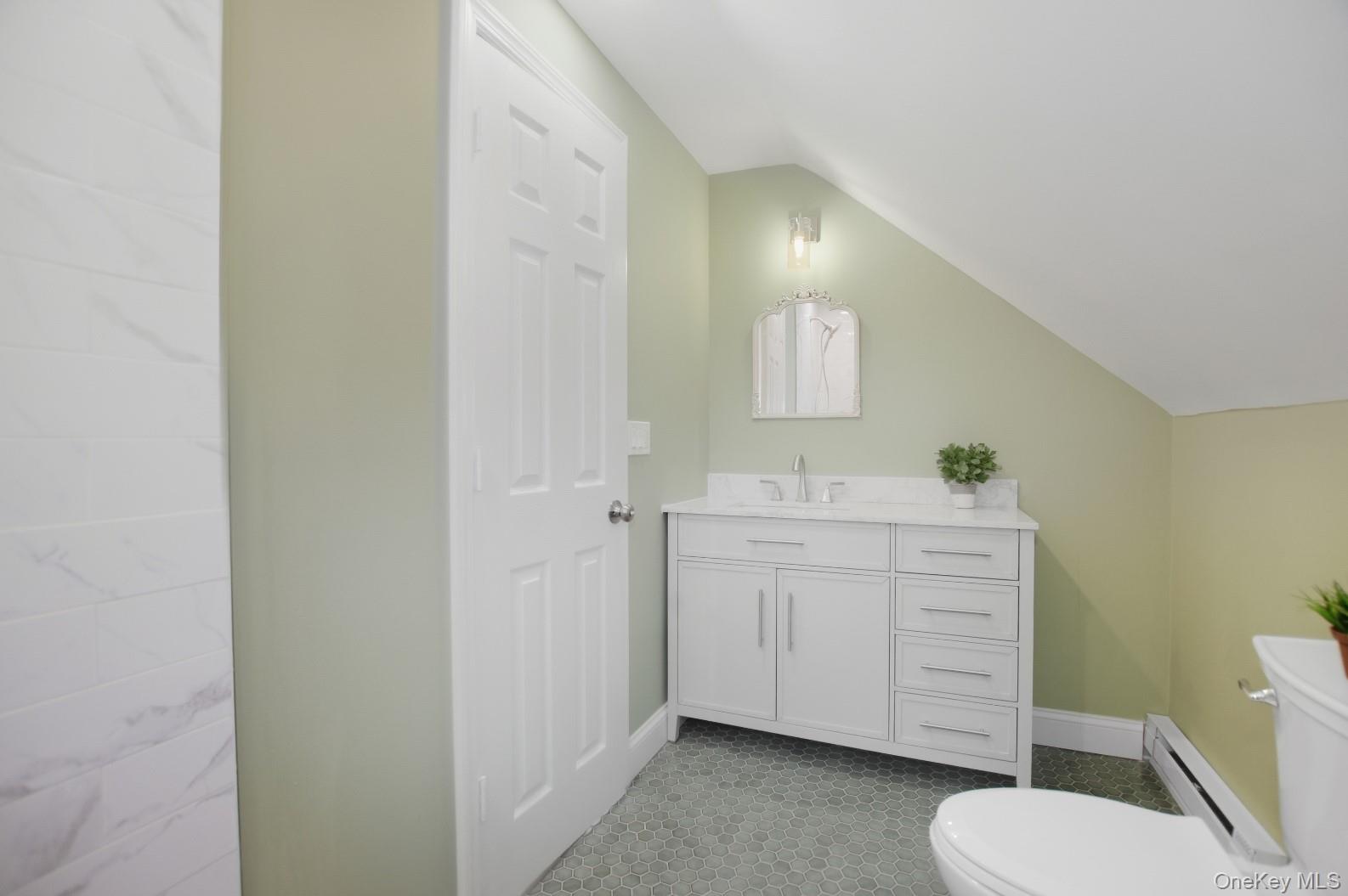 57 Remson Street Valley Stream, NY 11580 - Photo 19 of 27 Primary Bathroom featuring stylish tile