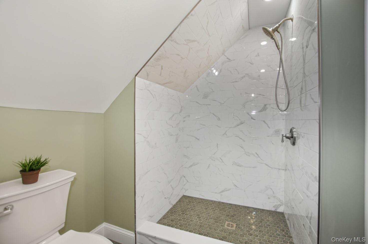57 Remson Street Valley Stream, NY 11580 - Photo 20 of 27 Primary bathroom featuring stylish tile
