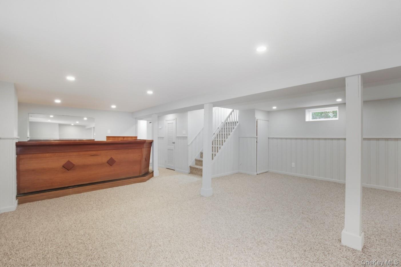 57 Remson Street Valley Stream, NY 11580 - Photo 21 of 27 Finished basement featuring custom bar, lots of space and cedar closet.