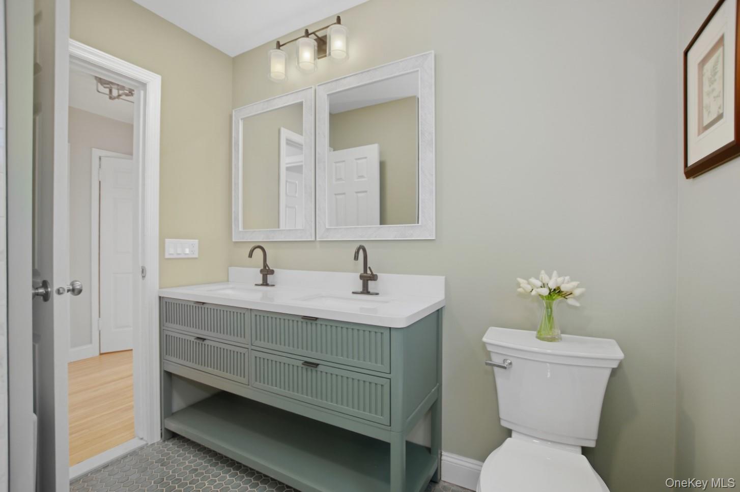 57 Remson Street Valley Stream, NY 11580 - Photo 10 of 27 Bathroom featuring double vanity stylish tile