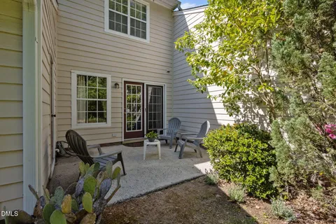 a view of two chairs in patio