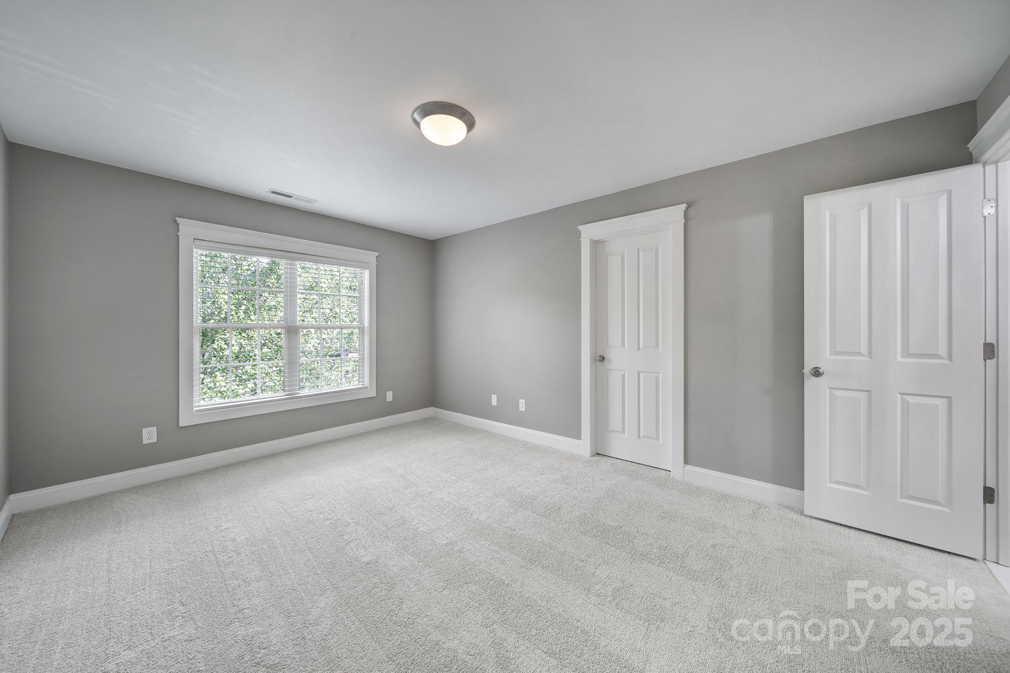 5633 Open Book Lane Charlotte, NC 28270 - Photo 22 of 48 a view of an empty room with a window