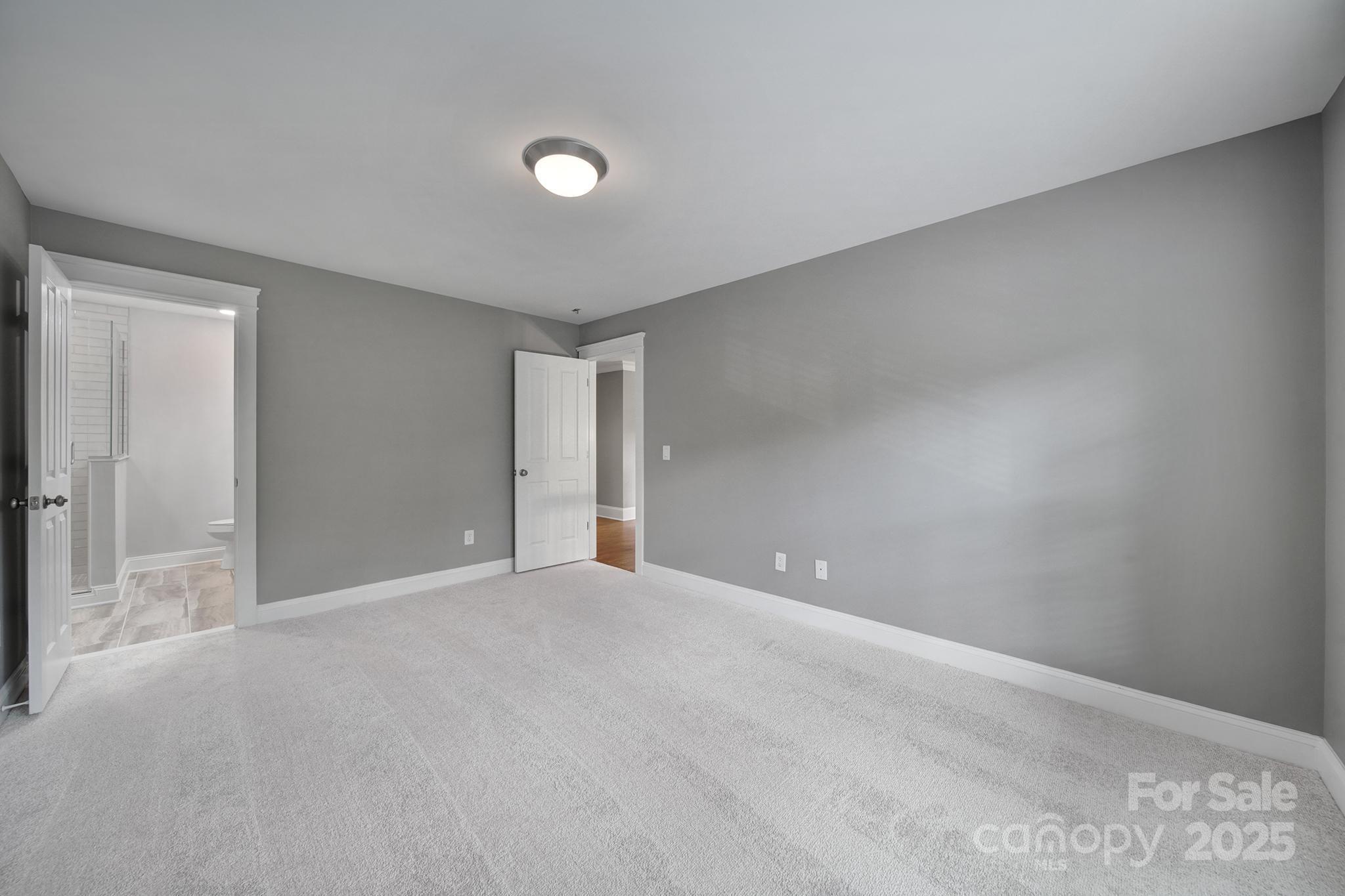 5633 Open Book Lane Charlotte, NC 28270 - Photo 23 of 48 a view of an empty room with a window