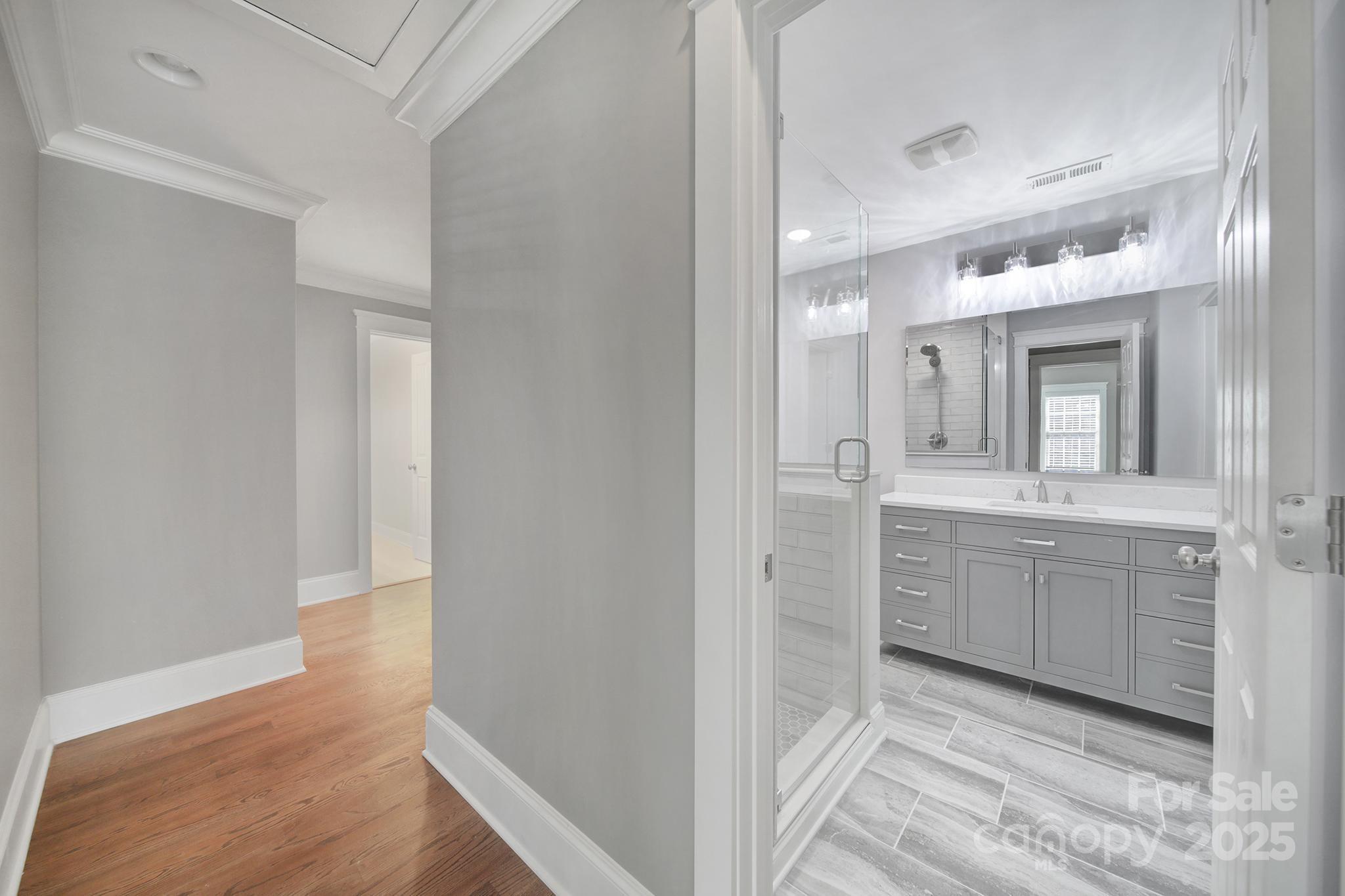 5633 Open Book Lane Charlotte, NC 28270 - Photo 25 of 48 a bathroom with a sink and a mirror