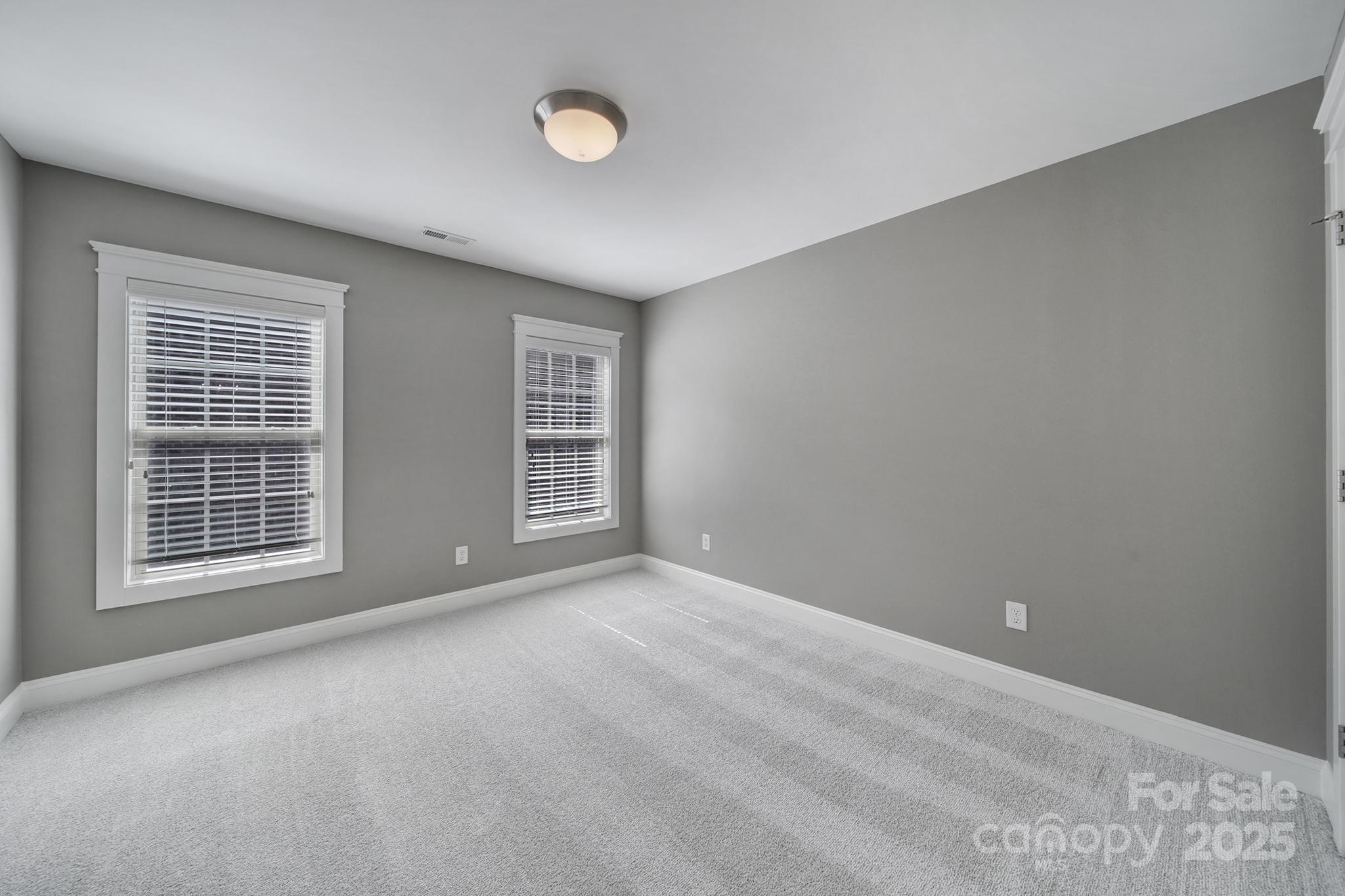 5633 Open Book Lane Charlotte, NC 28270 - Photo 28 of 48 an empty room with windows