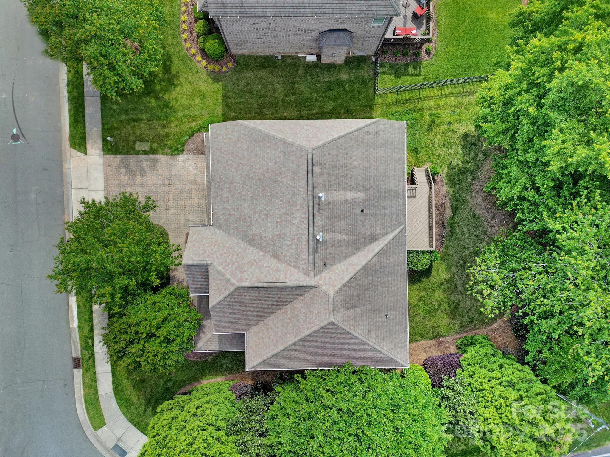 5633 Open Book Lane Charlotte, NC 28270 - Photo 4 of 48 an aerial view of a house with a yard
