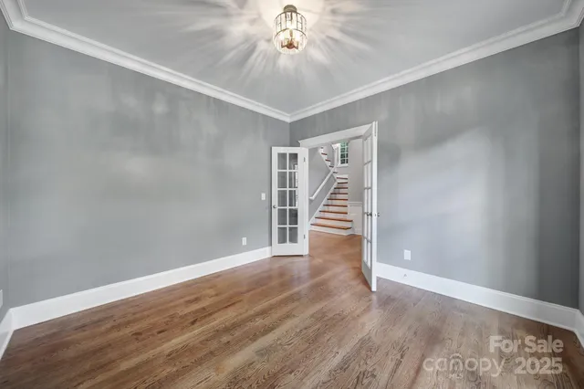 a view of balcony with wooden floor and fence