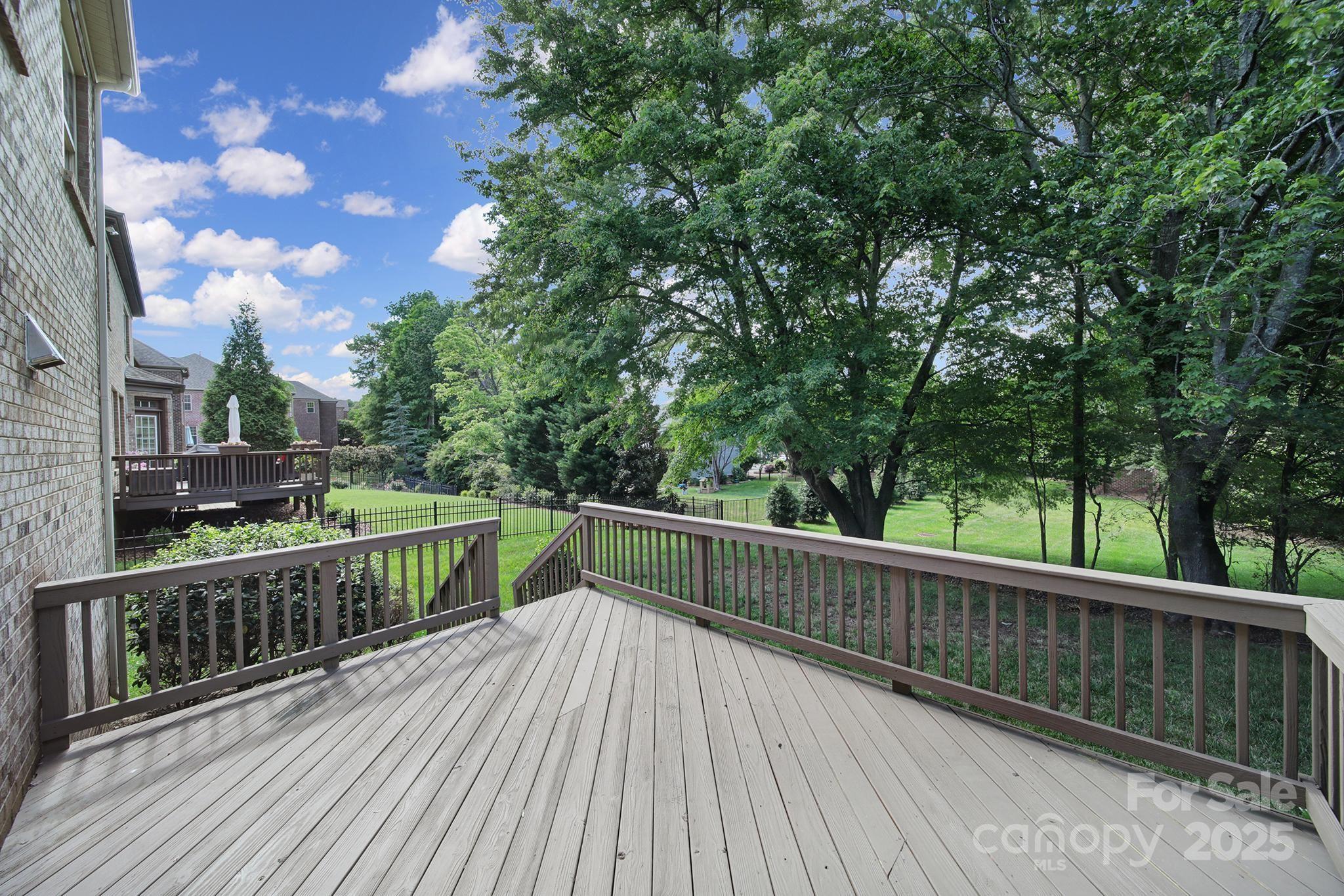 5633 Open Book Lane Charlotte, NC 28270 - Photo 43 of 48 a view of balcony with wooden floor and fence