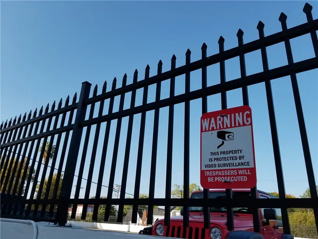 a view of swimming pool with outdoor seating and plants
