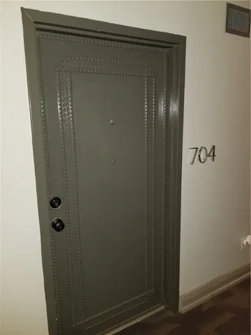 a bathroom with a glass door