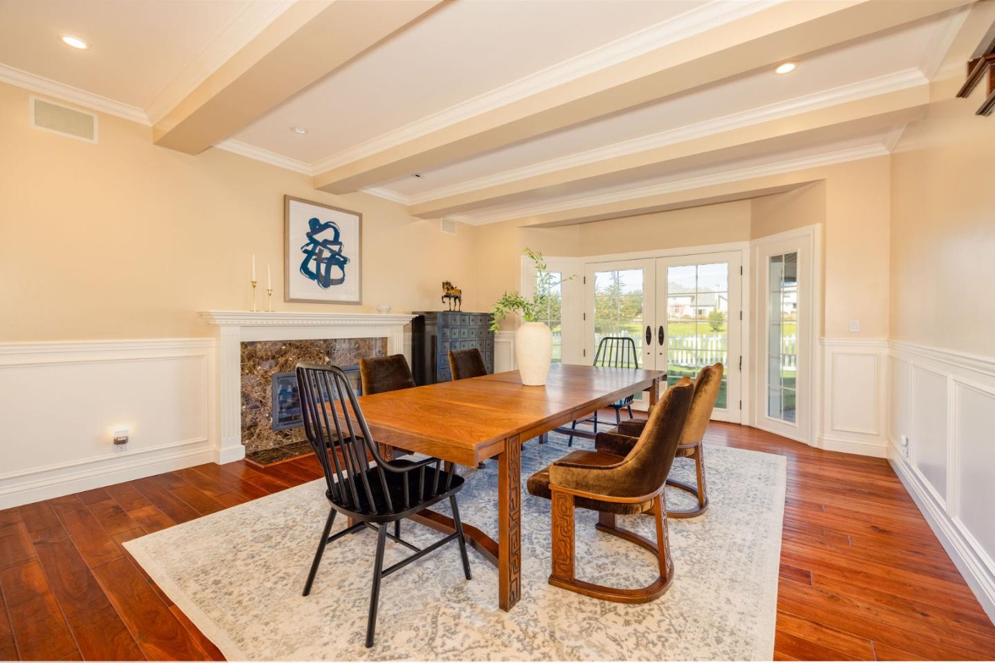 351 Cypress Point Road Half Moon Bay, CA 94019 - Photo 12 of 39 a dining room with furniture and wooden floor