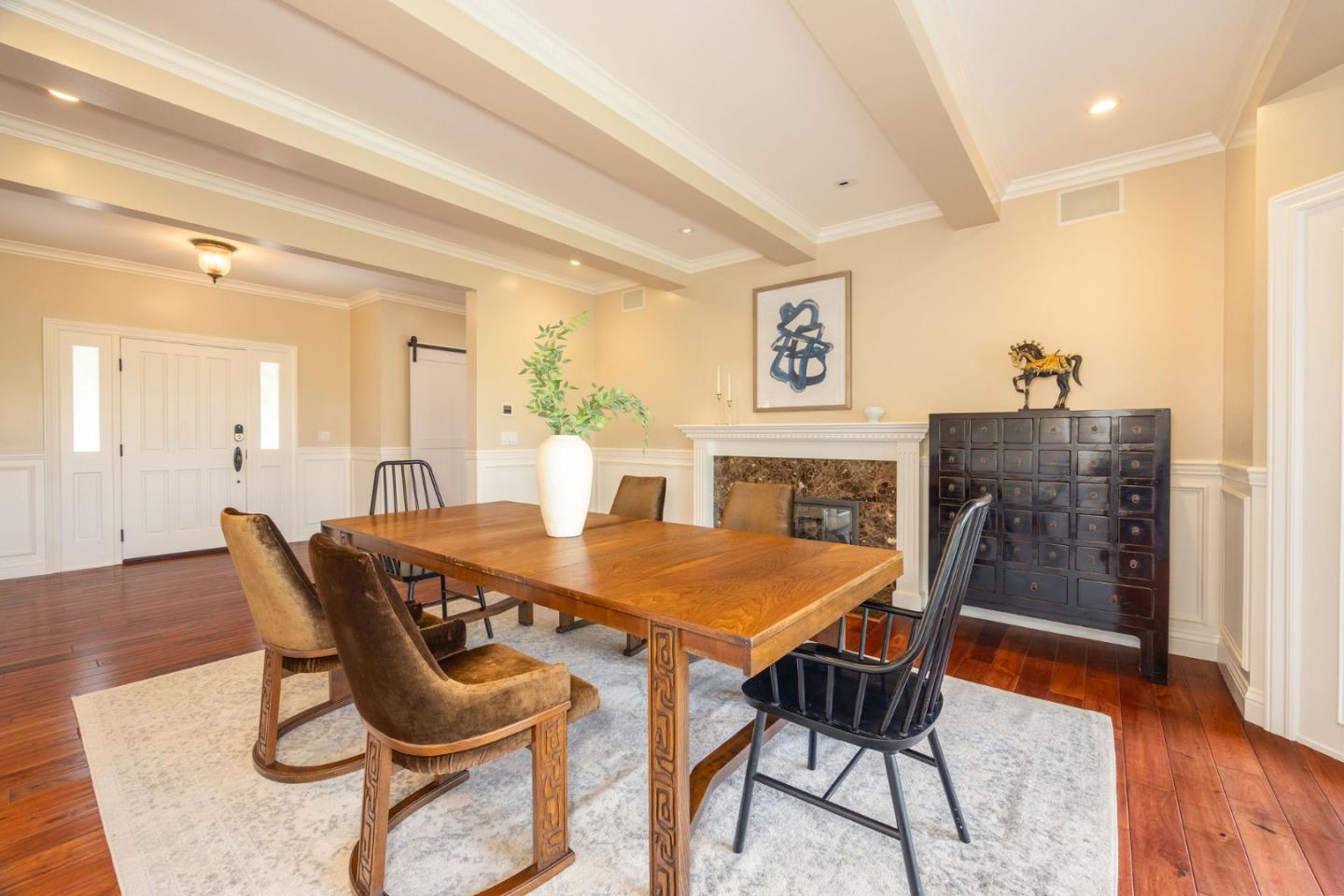 351 Cypress Point Road Half Moon Bay, CA 94019 - Photo 13 of 39 a view of a dining room with furniture and wooden floor