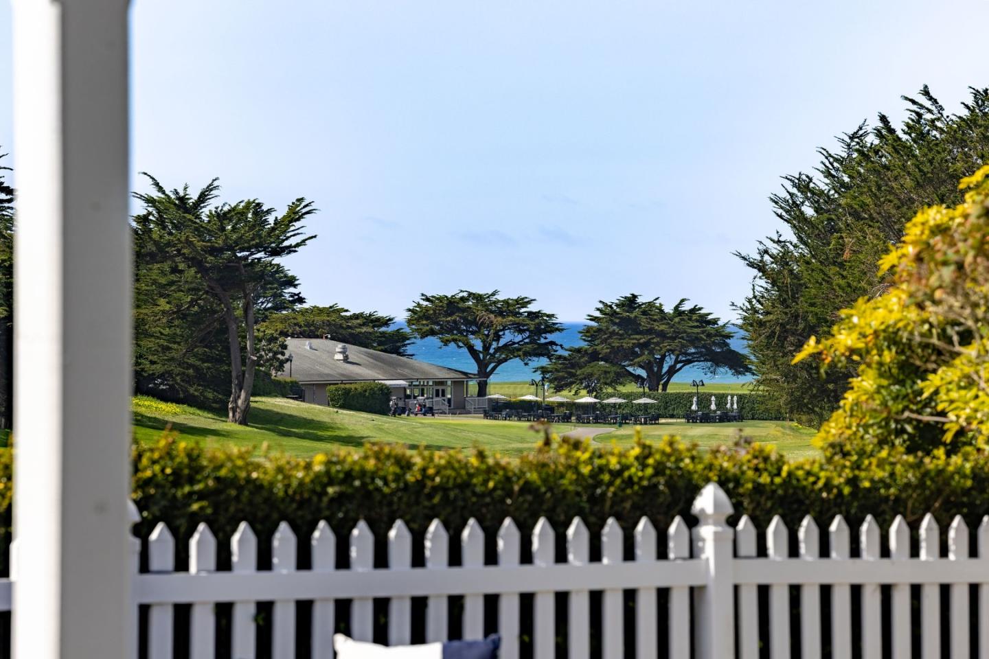 351 Cypress Point Road Half Moon Bay, CA 94019 - Photo 2 of 39 a view of a wooden fence