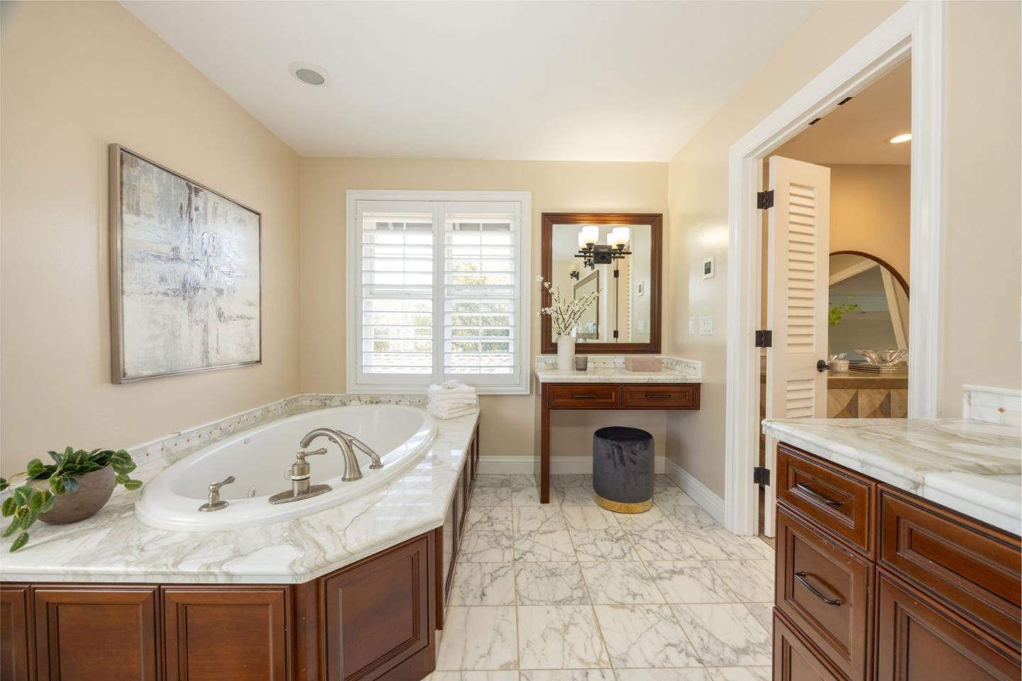 351 Cypress Point Road Half Moon Bay, CA 94019 - Photo 24 of 39 a bathroom with a granite countertop tub sink and mirror