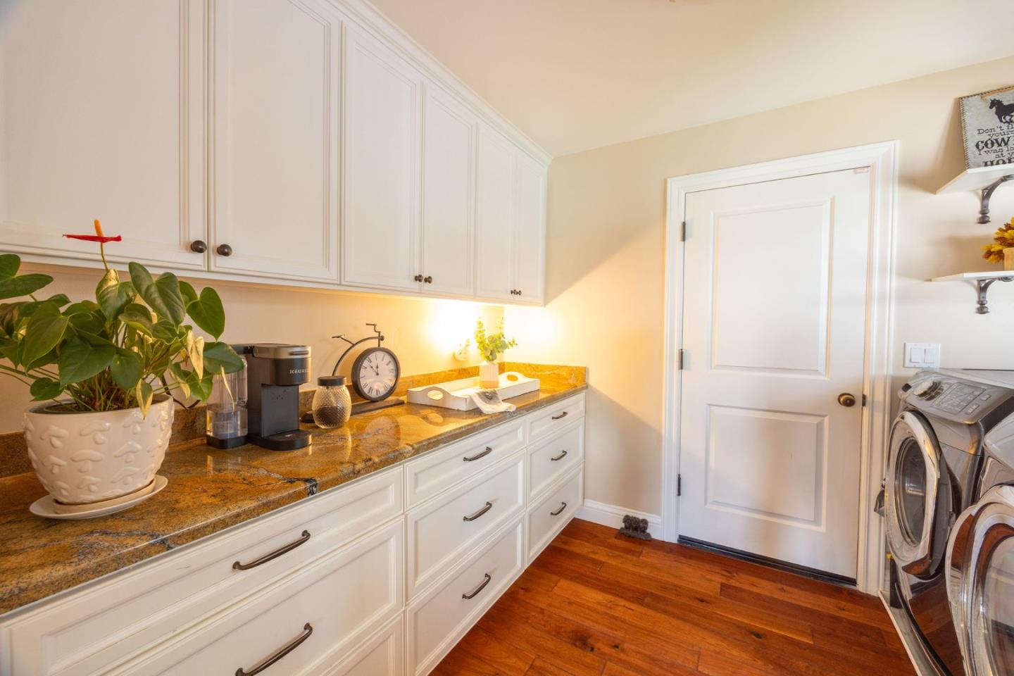 351 Cypress Point Road Half Moon Bay, CA 94019 - Photo 27 of 39 a kitchen with a refrigerator and cabinets