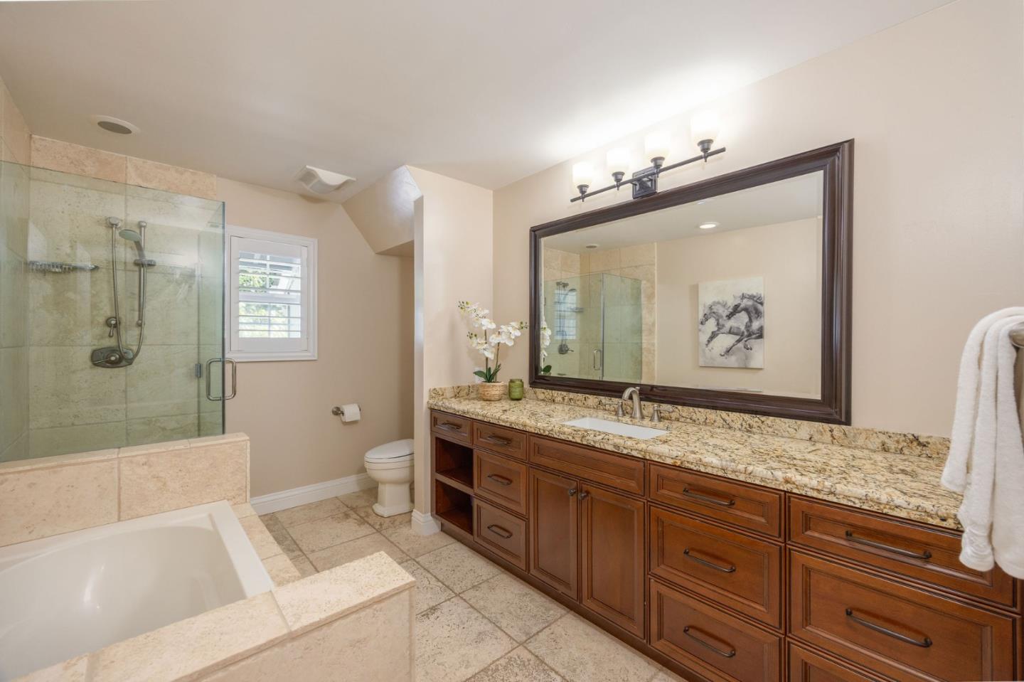351 Cypress Point Road Half Moon Bay, CA 94019 - Photo 28 of 39 a spacious bathroom with a granite countertop tub sink shower and mirror