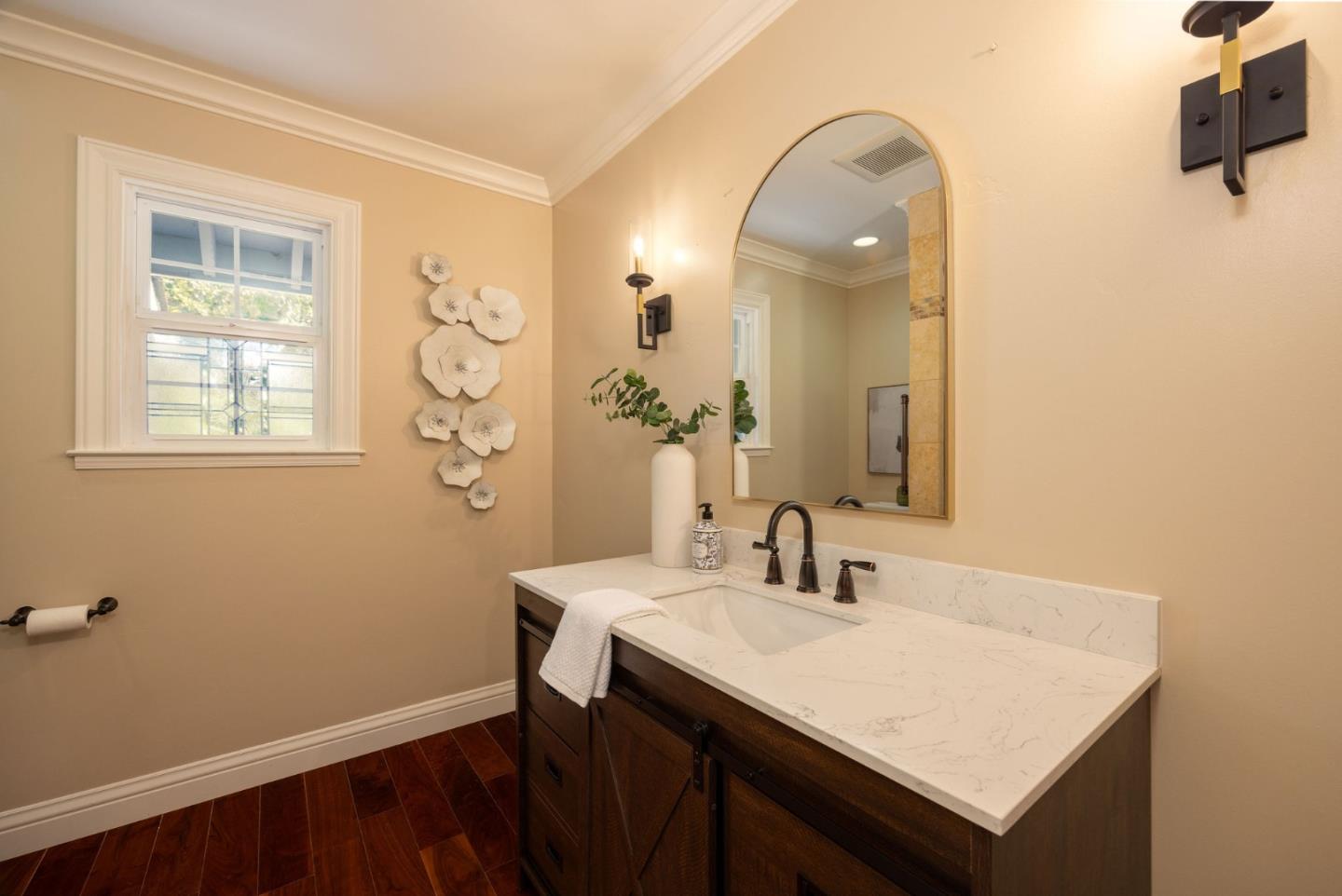 351 Cypress Point Road Half Moon Bay, CA 94019 - Photo 30 of 39 a bathroom with a sink a vanity and a mirror