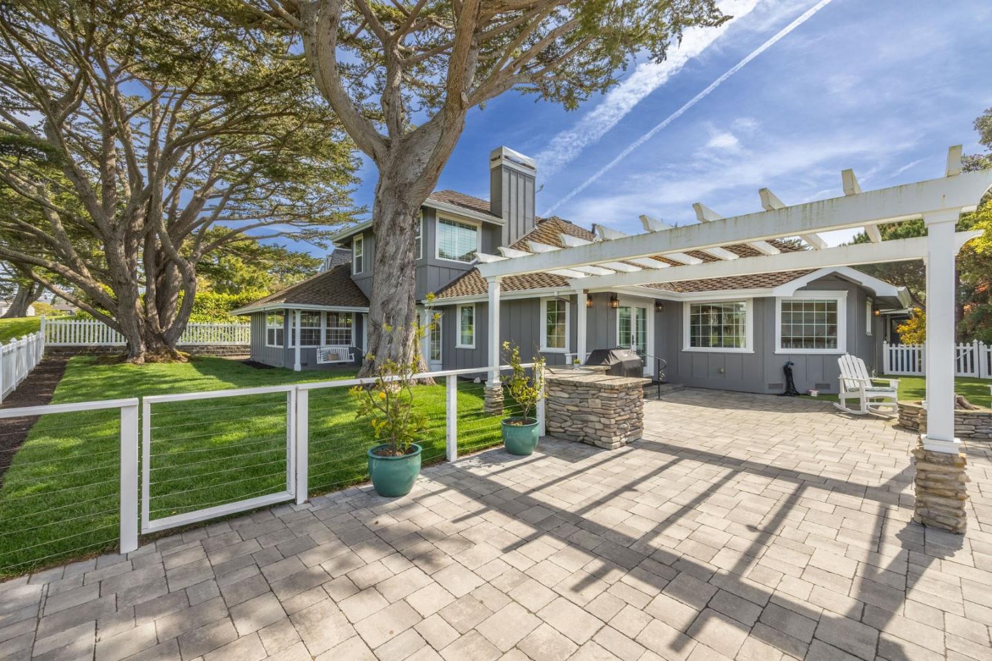 351 Cypress Point Road Half Moon Bay, CA 94019 - Photo 35 of 39 a view of a house with a yard