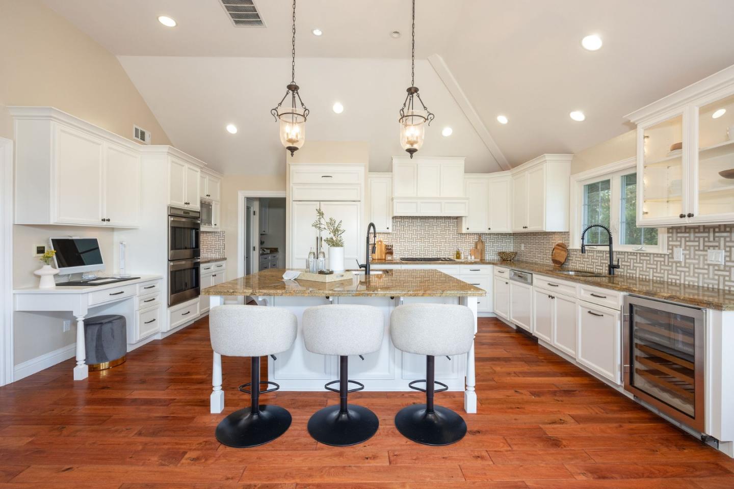 351 Cypress Point Road Half Moon Bay, CA 94019 - Photo 5 of 39 a large kitchen with a table and chairs