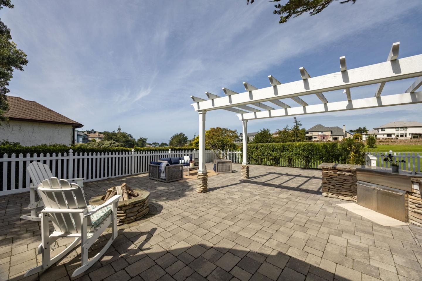 351 Cypress Point Road Half Moon Bay, CA 94019 - Photo 9 of 39 a view of a chairs and tables in the patio