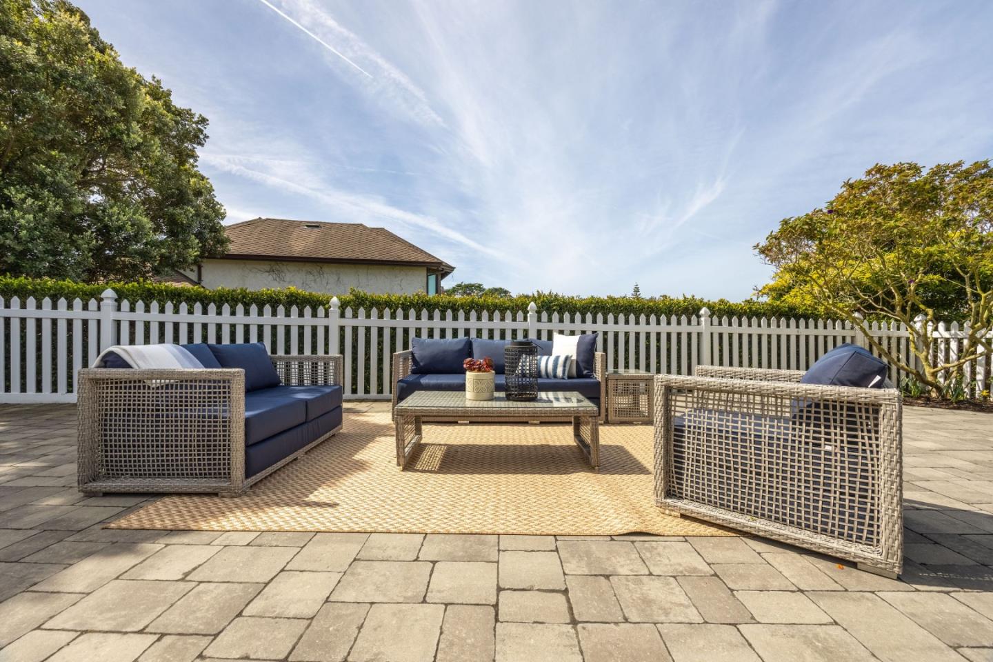 351 Cypress Point Road Half Moon Bay, CA 94019 - Photo 10 of 39 a view of a patio with a bench