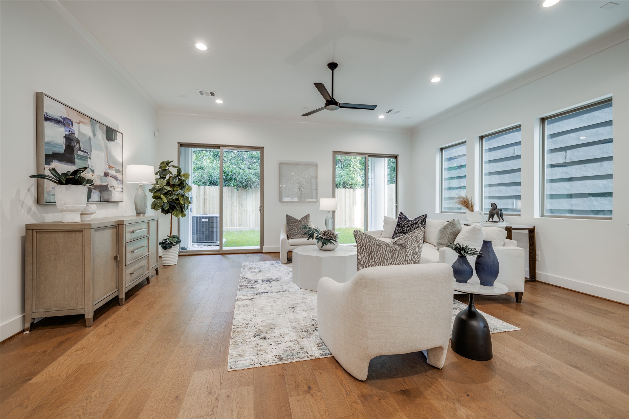 2325 Richton Street Houston, TX 77098 - Photo 21 of 47 a living room with fireplace furniture and a large window