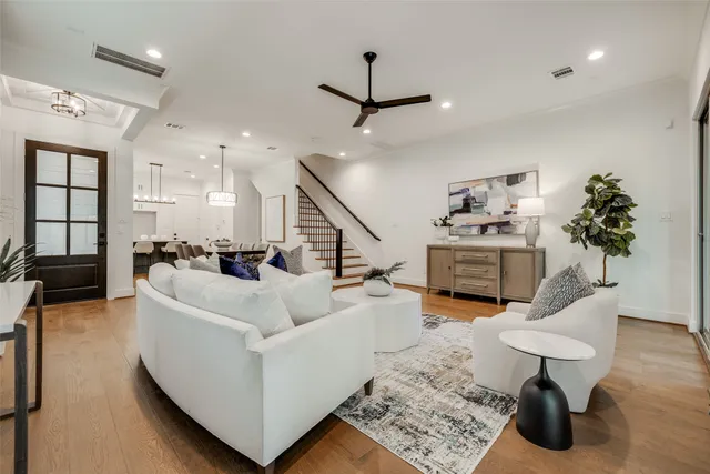 a bathroom with a tub a toilet and a shower