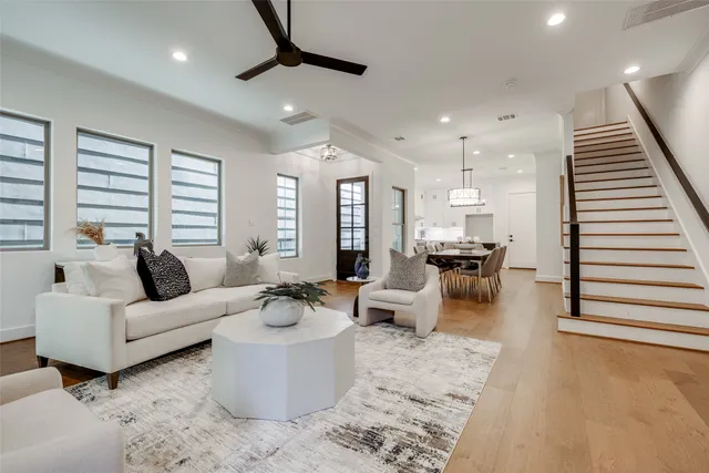 a bathroom with double vanity sinks and a mirror