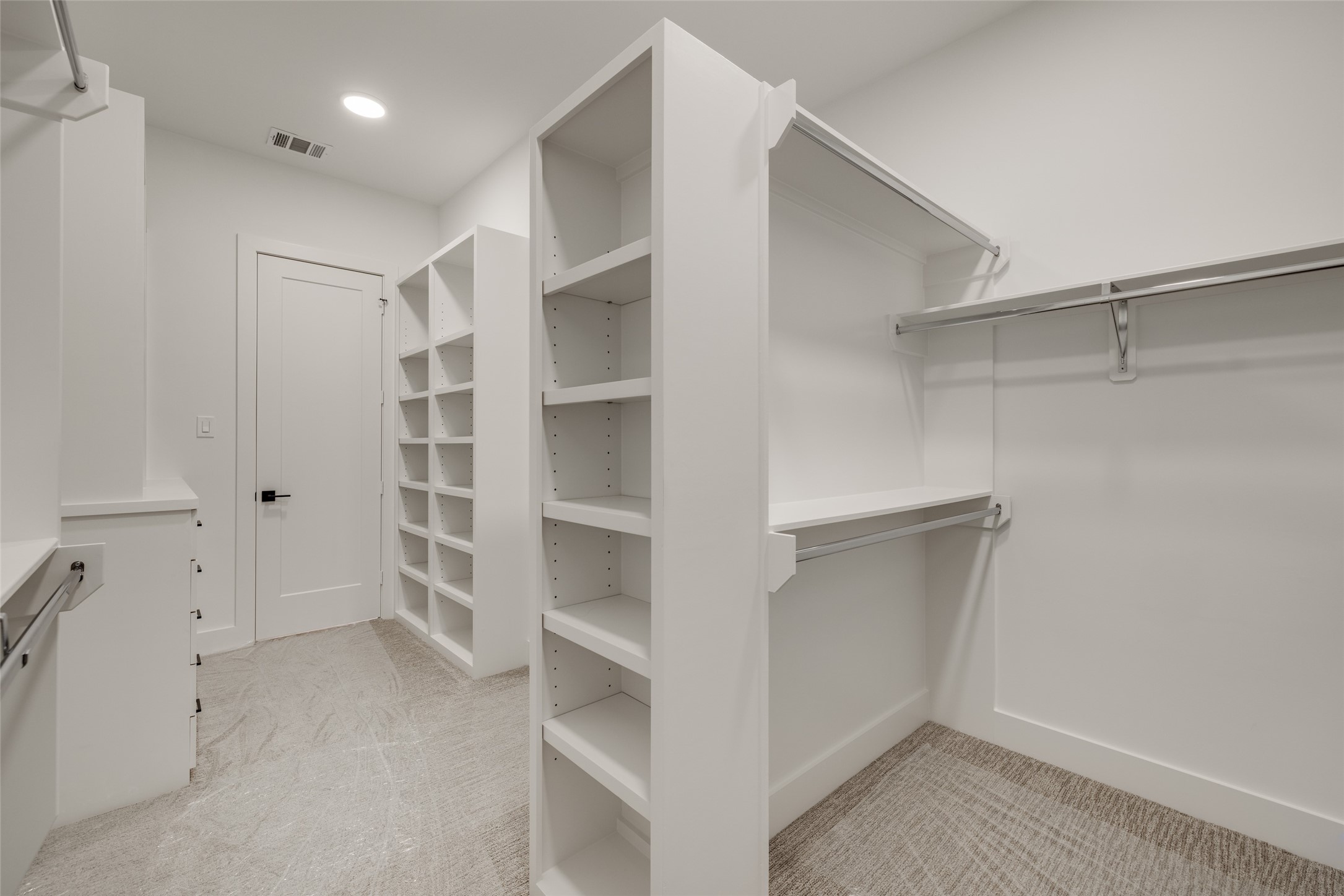 2325 Richton Street Houston, TX 77098 - Photo 32 of 47 a view of an empty walk in closet