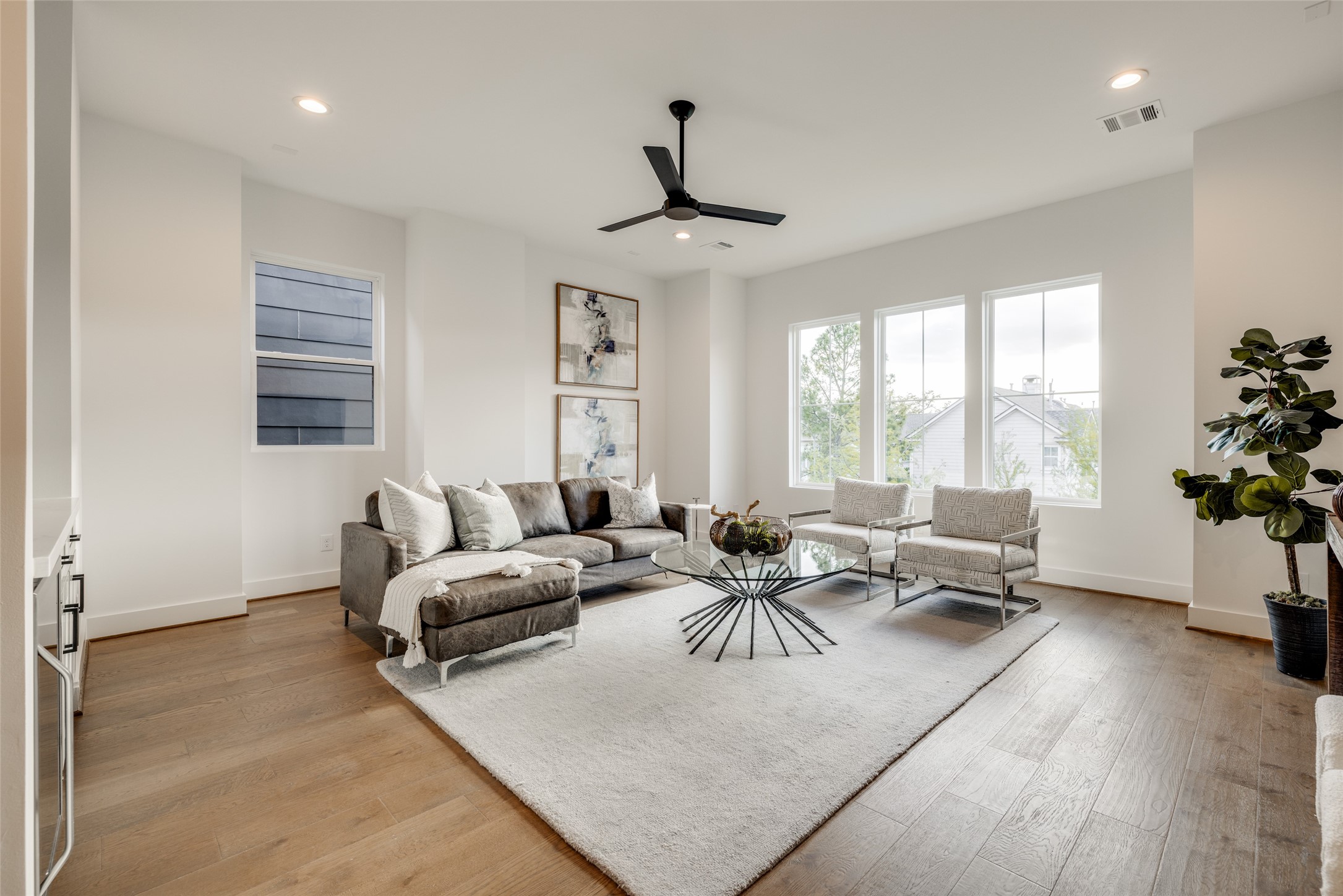 2325 Richton Street Houston, TX 77098 - Photo 36 of 47 a living room with furniture and a large window
