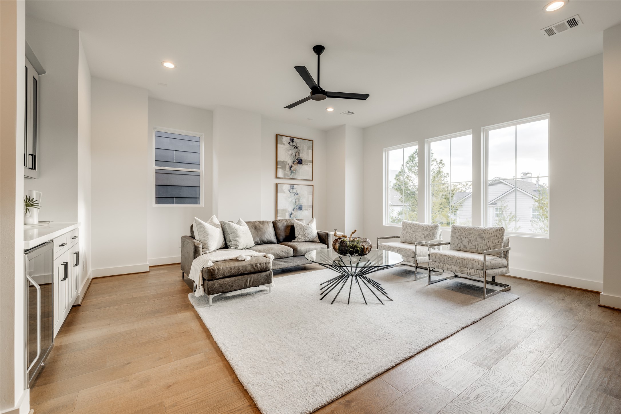 2325 Richton Street Houston, TX 77098 - Photo 37 of 47 a living room with furniture and large windows
