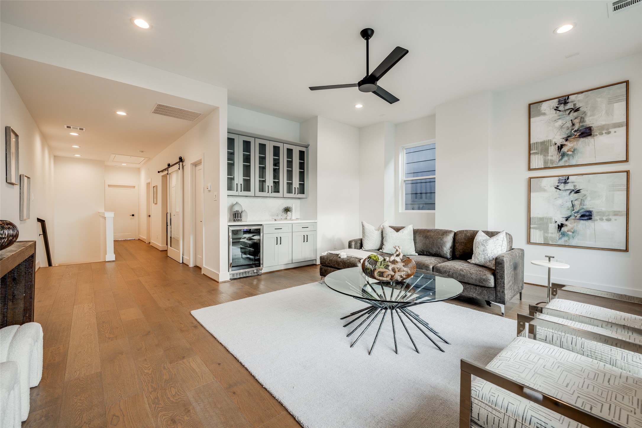 2325 Richton Street Houston, TX 77098 - Photo 38 of 47 a living room with furniture and a view of kitchen