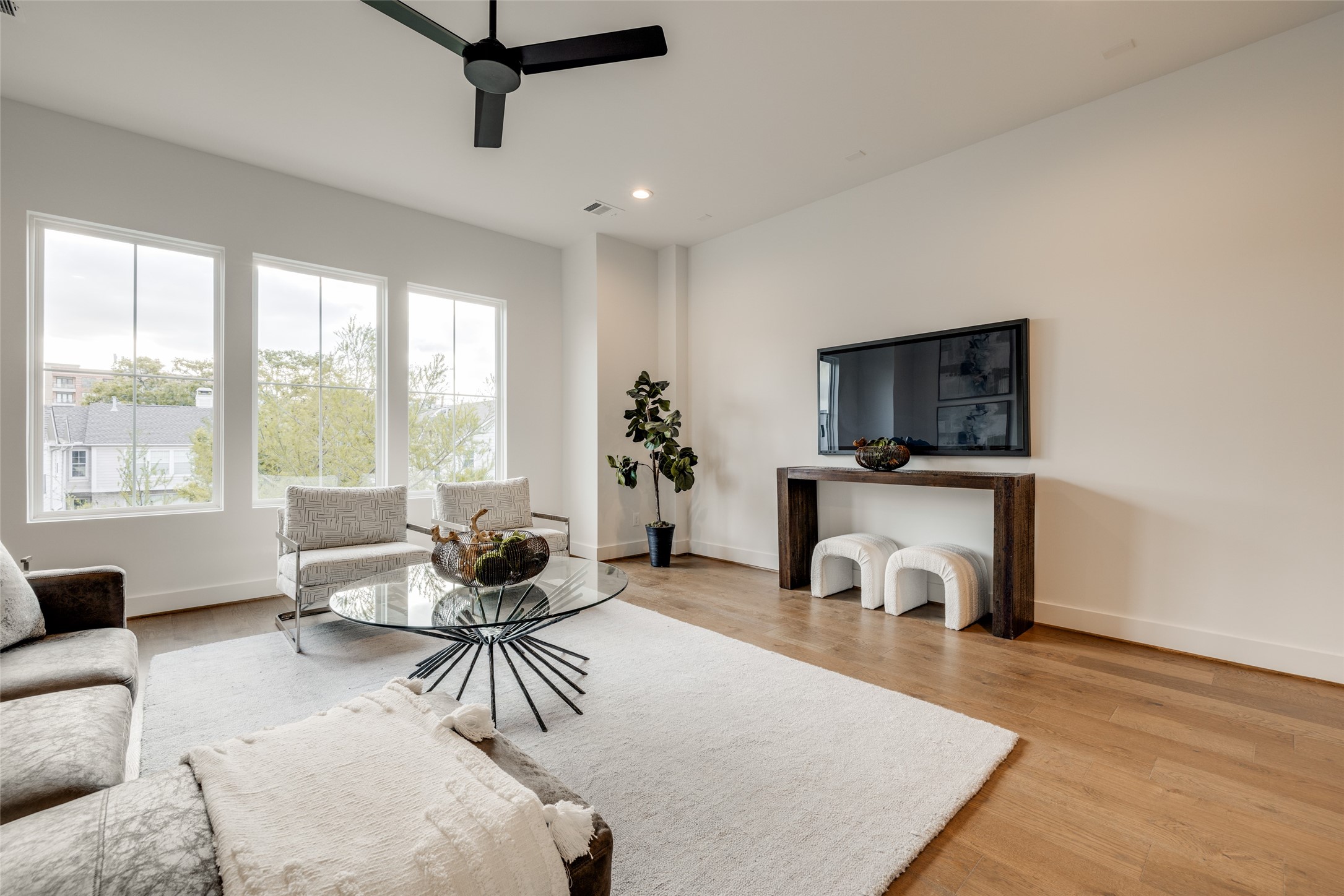 2325 Richton Street Houston, TX 77098 - Photo 40 of 47 a living room with furniture and a fireplace