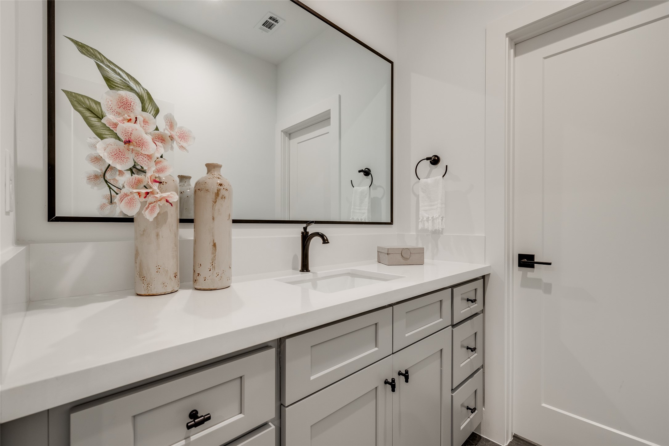 2325 Richton Street Houston, TX 77098 - Photo 43 of 47 a bathroom with a sink and a mirror